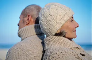 Headpiece Prints: Senior couple back to back on beach