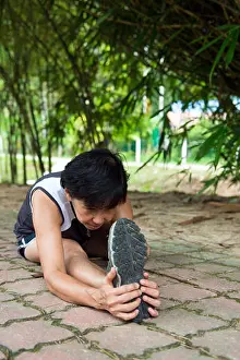 Toes Prints: Senior woman exercising in park