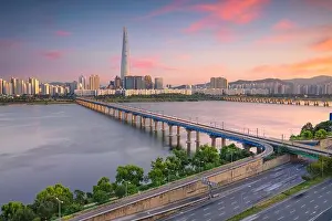 Business District Prints: Seoul. Cityscape image of Seoul and Han River during twilight blue hour