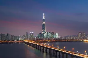 Seoul cityscape with Lotte tower at twilight sunset near Han river in Seoul, South Korea