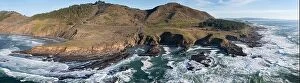 Aerial Landscape Collection: The serene Pacific Ocean washes onto the rugged coastline of Northern California