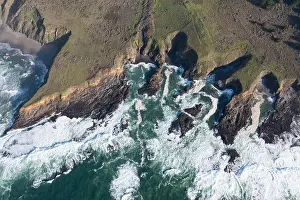 The serene Pacific Ocean washes onto the rugged coastline of Northern California, not far north of Fort Bragg in Mendocino County