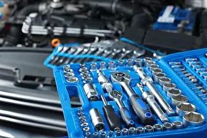Construct Prints: Set of different auto mechanic's tools at automobile repair shop, closeup