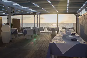 Wooden Floor Prints: 'set table'cafe restaurant sunset 'lens flare' sea horizon [beach cafe] [sea restaurant]