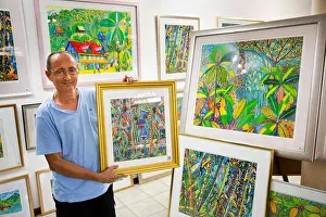 Honeymoon Prints: The Seychelles, Mahe, Baie Lazare, artist Gerard Devoud in his gallery