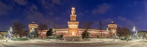 Sforzesco Castle and fountain in Milan, Italy at twilight