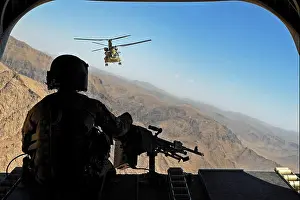 Connecticut Prints: Sgt. Zach Smola, rear door gunner on a CH-47