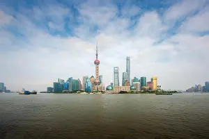 Shanghai lujiazui finance and business district trade zone skyline with cruise ship, Shanghai China