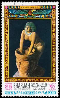 Tutankhamun Prints: SHARJAH - CIRCA 1968: Stamp printed Sharjah shows a sculpture of woman