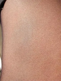 Ripped Prints: shiny thin black tights, women's leg in nylon pantyhose