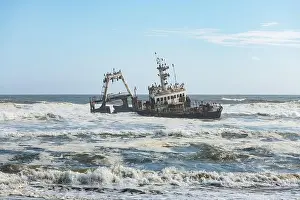 Shipwreck Prints: The shipwreck in the Atlantic ocean on Skeleton Coast near Swakopmund in Namibia