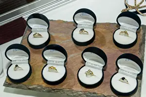 Emerald Prints: A shop display case of earrings