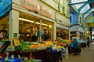 Multicultural Prints: Shop specialising in African and Caribbean foods in Brixton Village market in London England UK