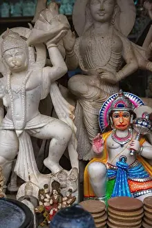 Wristband Prints: Shop in Varanasi, India with statues of gods and goddesses, one of which is painted