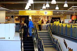 Milton Prints: Shoppers on an escalator at Ikea in Milton Keynes
