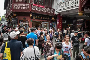 Miao Prints: Shoppers shopping market street Chenghuang Miao City God Temple Shanghai, China