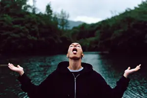 Catching Prints: Short haired female with piercing wearing black hoodie