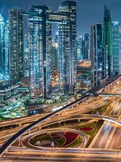 A shot of Dubai city showing Sheikh Zayed Road intersection and Burj Khalifa
