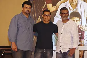 Siddharth Roy Kapur Bollywood actor Aamir Khan and filmmaker Nitesh Tiwari during poster launch of film Dangal Mumbai