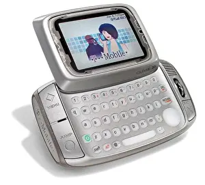 On White Prints: Sidekick mobile phone handset by t-mobile with visible keypad photographed on a white background