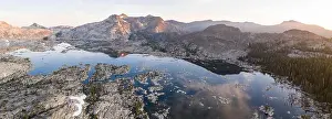 The Sierra Nevada mountain range in California is made up of 100 million year old granite peaks that were sculpted by glaciers over geologic time
