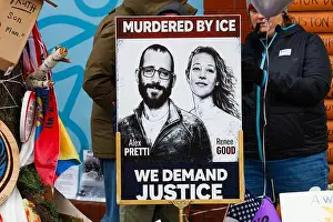City Street Prints: A sign displaying portraits of Alex Pretti and Renee Good at the Alex Pretti memorial site