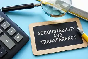Truth Prints: A sign with an inscription Accountability and transparency and a magnifying glass