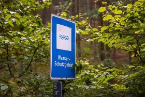Protected Area Prints: Sign of 'Wasserschutzgebiet' translation in english is 'water reserve' in a german forest