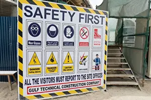 Signboard at construction site in Dubai with safety rules and regulations