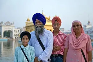 Punjab Prints: Sikh family at the Golden Temple. Amritsar. Punjab. India