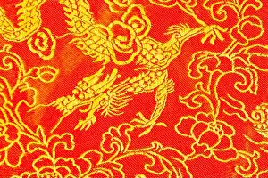 Frontage Prints: Silk fabric in yellow and red with traditional Chinese motifs