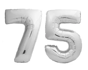 Inflatable Prints: Silver chrome number 75 seventy five made of inflatable balloon on white