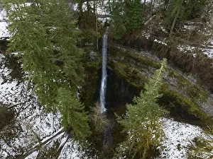Silver Creek flows over a beautiful waterfall near Silverton, Oregon. This scenic, heavily forested area has many impressive waterfalls