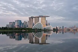 Singapore business district skyline financial downtown building with tourist sightseeing in night at Marina Bay, Singapore. Asian tourism, modern city