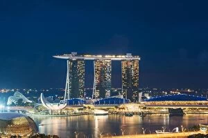 Images Dated 14th April 2017: Singapore business district skyline in night at Marina Bay, Singapore