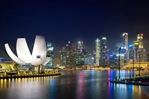 Singapore business district skyline in night at Marina Bay, Singapore