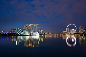 Singapore business district skyline in night at Marina Bay, Singapore. Asia