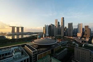 Images Dated 15th April 2017: Singapore business district skyline before sunrise at Marina Bay, Singapore