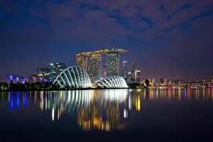 Singapore business district skyline before sunrise at Marina Bay, Singapore