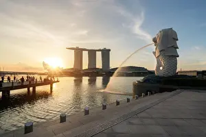 Singapore business district skyline with sunrise in morning at Marina Bay, Singapore
