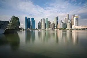 Singapore business district with skyscraper building and reflection at Marina Bay, Singapore