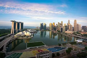 Singapore cityscape at dusk. Landscape of Singapore business building around Marina bay. Modern high building in business district area at twilight