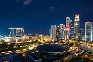 Singapore cityscape at dusk. Landscape of Singapore business building around Marina bay. Modern high building in business district area at twilight