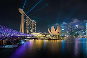 Singapore Marina bay at night, Singapore city with light show is famous and beautiful show