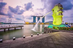 SINGAPORE - SEPTEMBER 6, 2015: The Merlion fountain at Marina Bay. The merlion is a marketing icon used as a mascot and national personification of Si