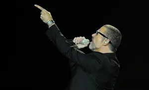 Pose Prints: Singer George Michael is pictured during a concert at the 02 World in Hamburg