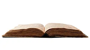 Faded Prints: Single old worn jewish book. Open pages of Torah isolated on white background