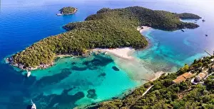 Sivota - stunning aerial view of turquoise sea known as Blue Lagoon and unique beach Bella Vraka. Epirus, Greece