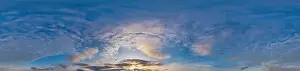 Sky panorama on sunset with Cirrus clouds in Seamless spherical equirectangular format as full zenith for use in 3D