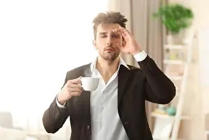 Wake Prints: Sleepy guy holding a cup of coffee